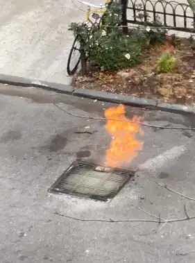 Fire emanating from a stormwater drain in Manhattan