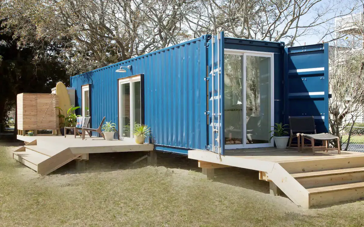 A shipping container that has been partially converted into a living space