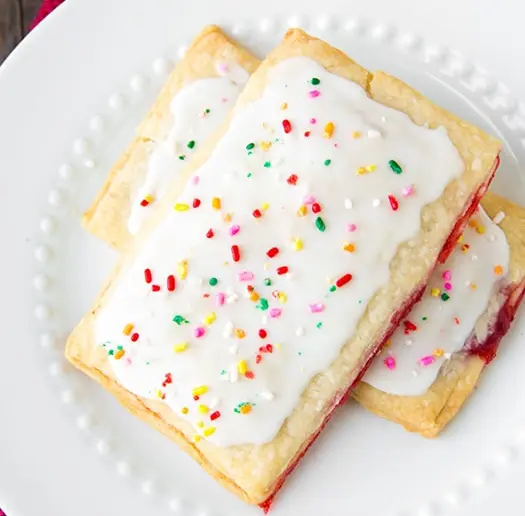 A pop-tart (a rectangular tart with glazing, intended to be cooked in a toaster, as breakfast for an American)