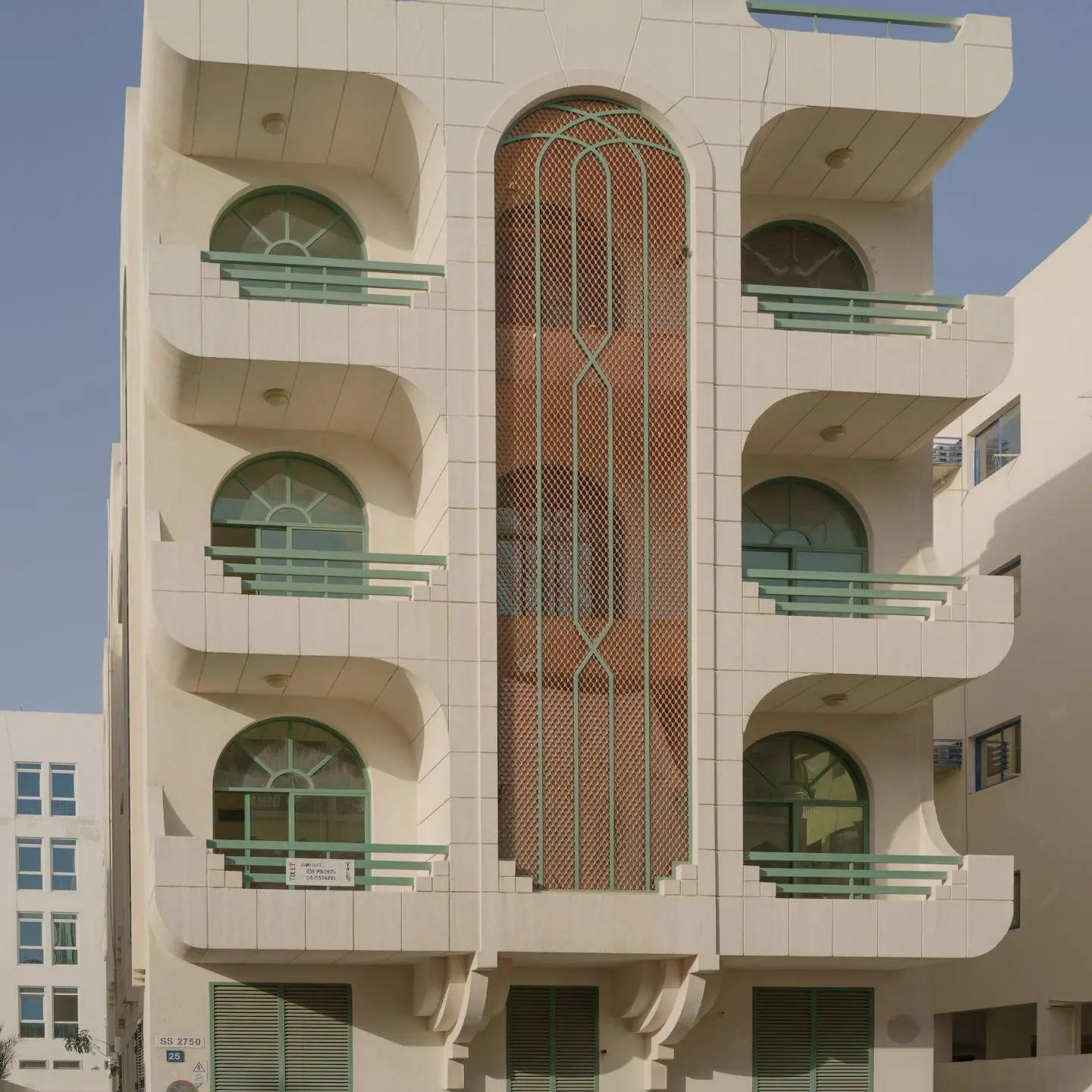 An apartment building mostly following the Art Deco style, in Dubai